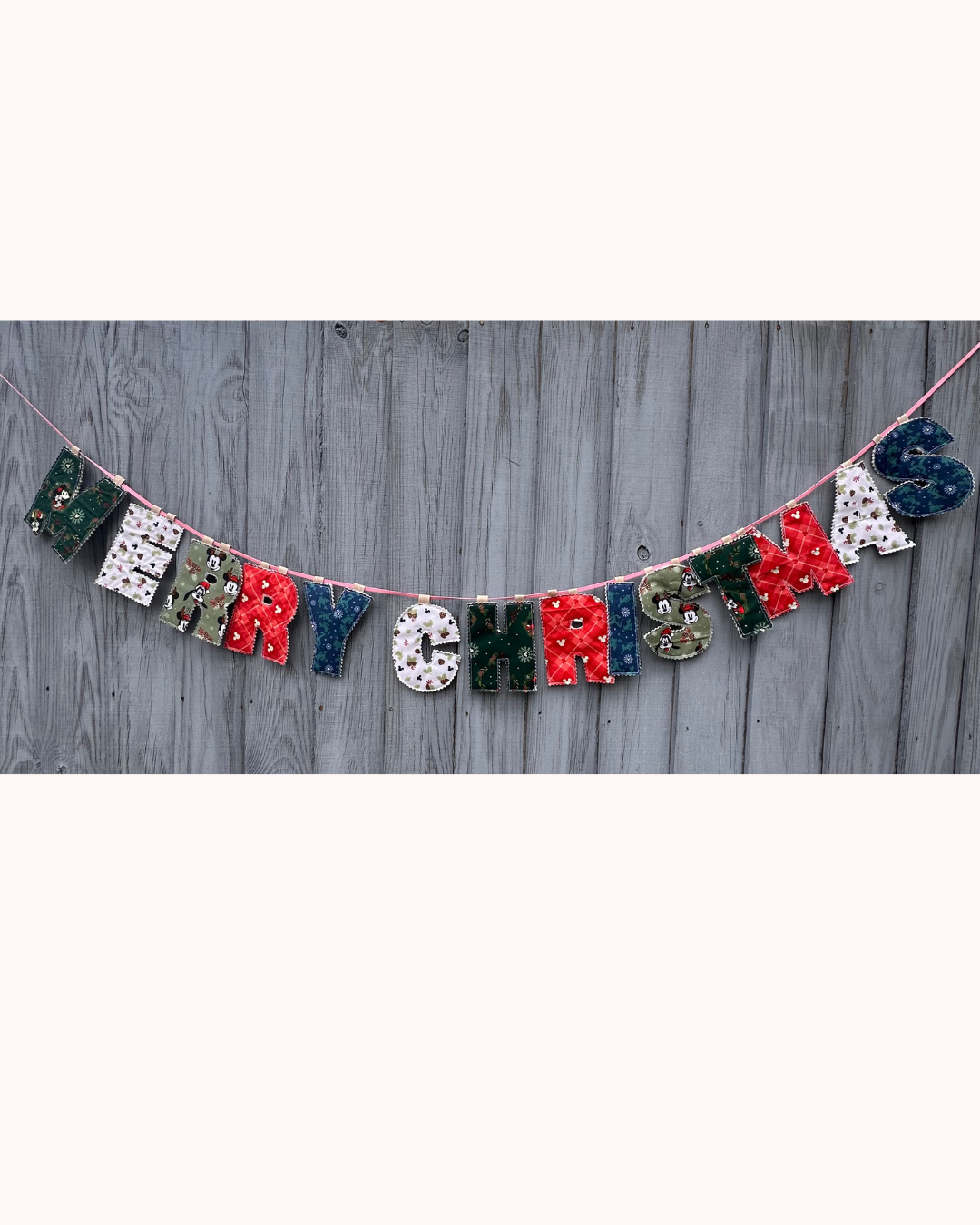 Puffy letters spelling " Sophia" in colourful fabric